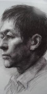 素描男青年头像作品